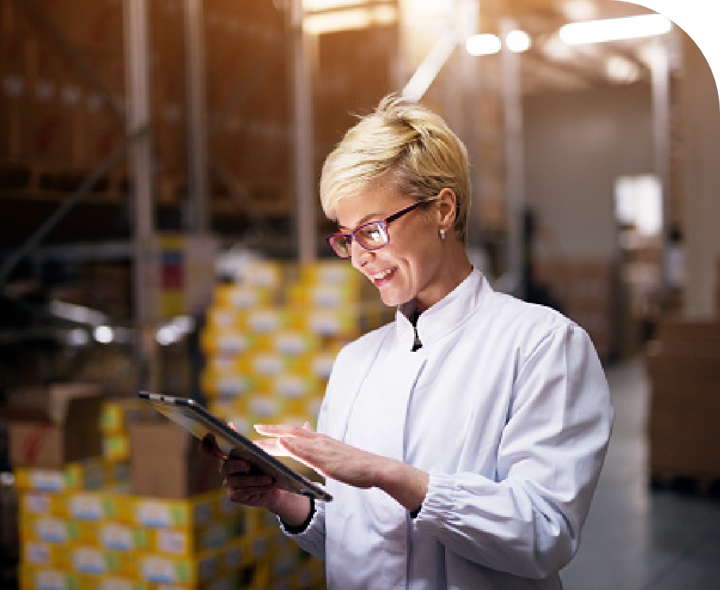 Women in stock room using an ERP software for the food industry